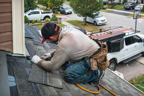 Professional Roofing technician working in Naches, WA